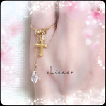 SWAROVSKIとクロスのサンキャッチャーリング ゴールド