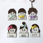 〔名入れ〕にこにこリボン▷◁キーホルダー