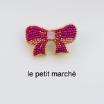 ピンクのリボンのビーズ刺繍ブローチ