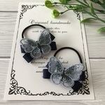 レースと刺繍の蝶々のツインヘアゴム　ネイビー　（ゴムの交換ができます）