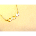 インフィニティと三角パールのネックレス