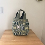 ミナペルホネン  sky flower khaki のバルーントート