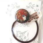 オルゴニャイトヘアゴム　「おうかがいねこ」のヘアゴム　ブラウンカラー