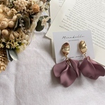 gold × flower petals (pink)