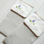 (A様オーダー品)エゾエンゴサク刺繍のトイレットペーパーホルダーカバー2セット