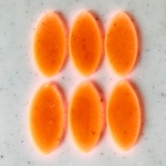 Clear Neon Orange Oval Pendant Tops