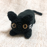 長い猫（黒猫）