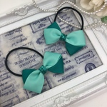 中央キラキラmint green♡crossリボンのヘアゴム ２個set