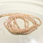 淡水パールライス小粒ライトオレンジ約40cm1連