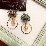 ハンドメイドピアス　セルリアンブルーのお花ピアス💐