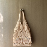 レトロなパイナップル模様の手提げバッグ