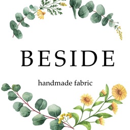 BESIDE