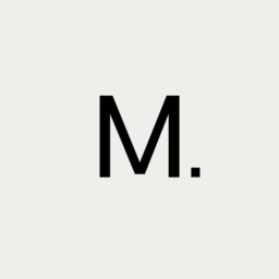 M.