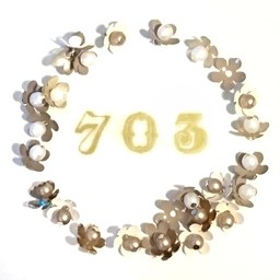 703